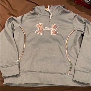 Grey with camp under armour hoodie.